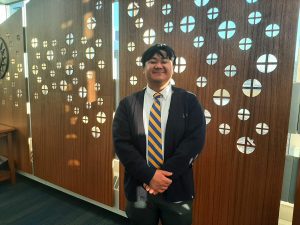 Augustin Khey in the chapel at Cristo Rey Jesuit High School