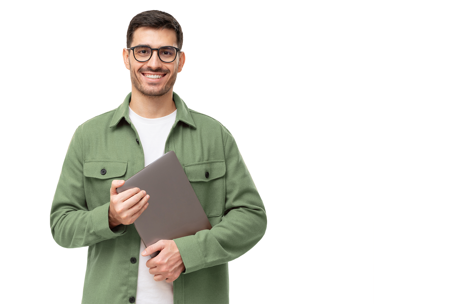 Male college student smiling holding closed laptop